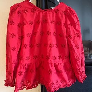 Red eyelet peplum shirt from Madewell